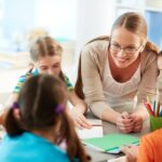 teaching assistant with young pupils